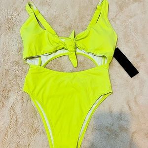 Lime green one piece bathing suit nwt.